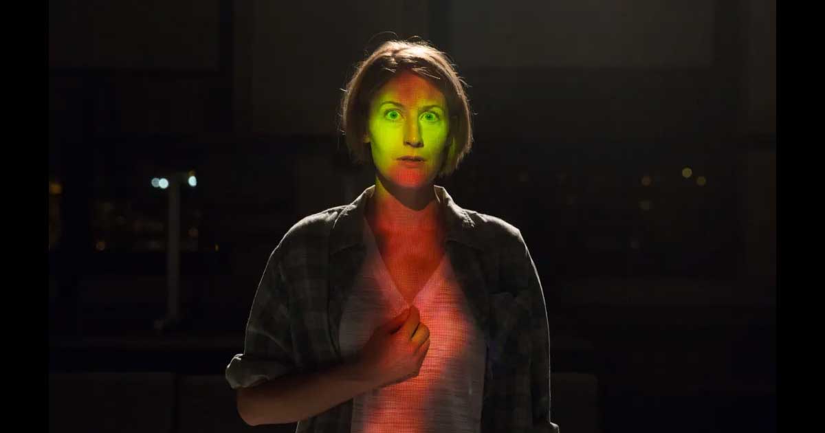 actor with green light on face