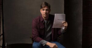 Actor holding paper