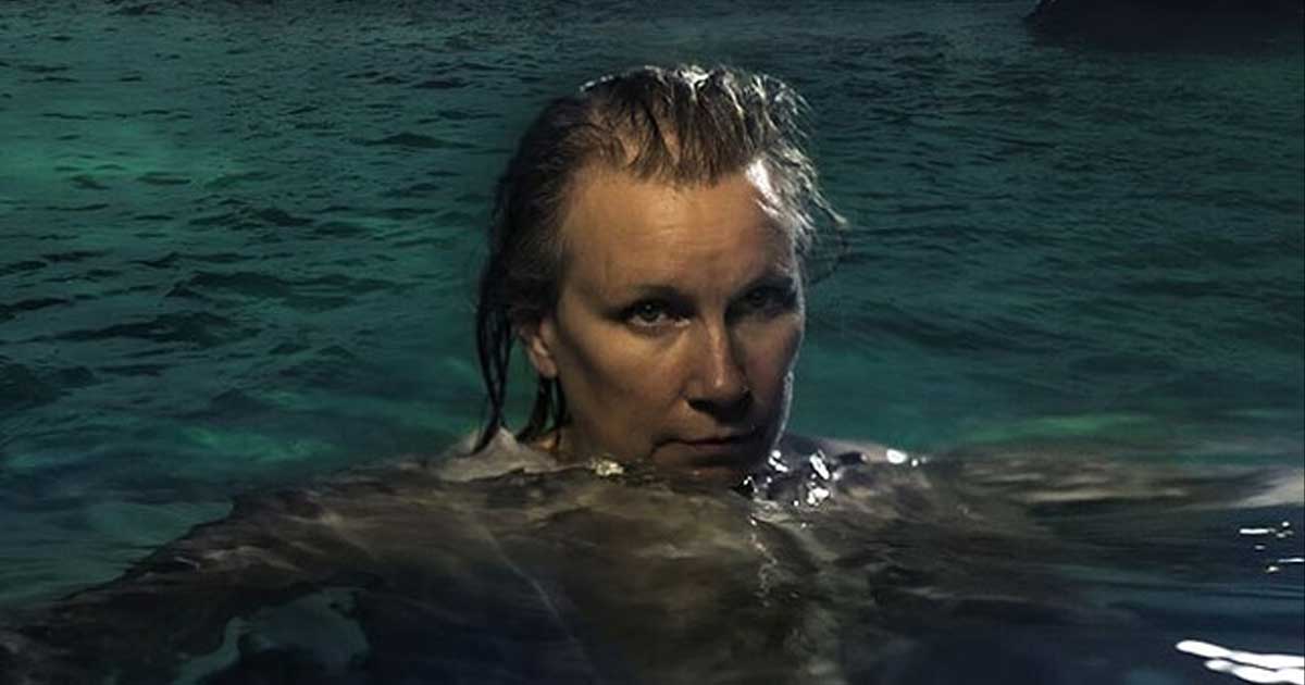 woman swimming in water