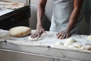hands making dough